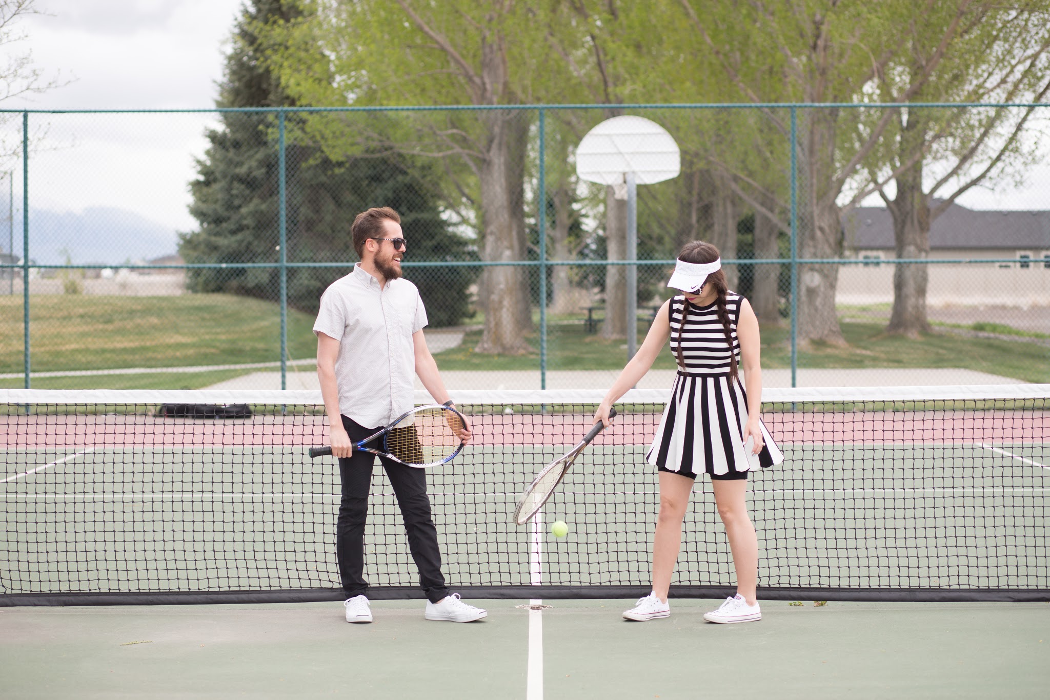 Cute Couples Playing Tennis
