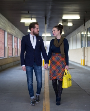 a speckled blazer and a plaid skirt