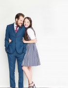 A Lace Gown and A Gray Suit