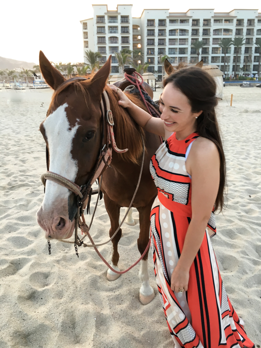 couples romantic horse ride on the beach